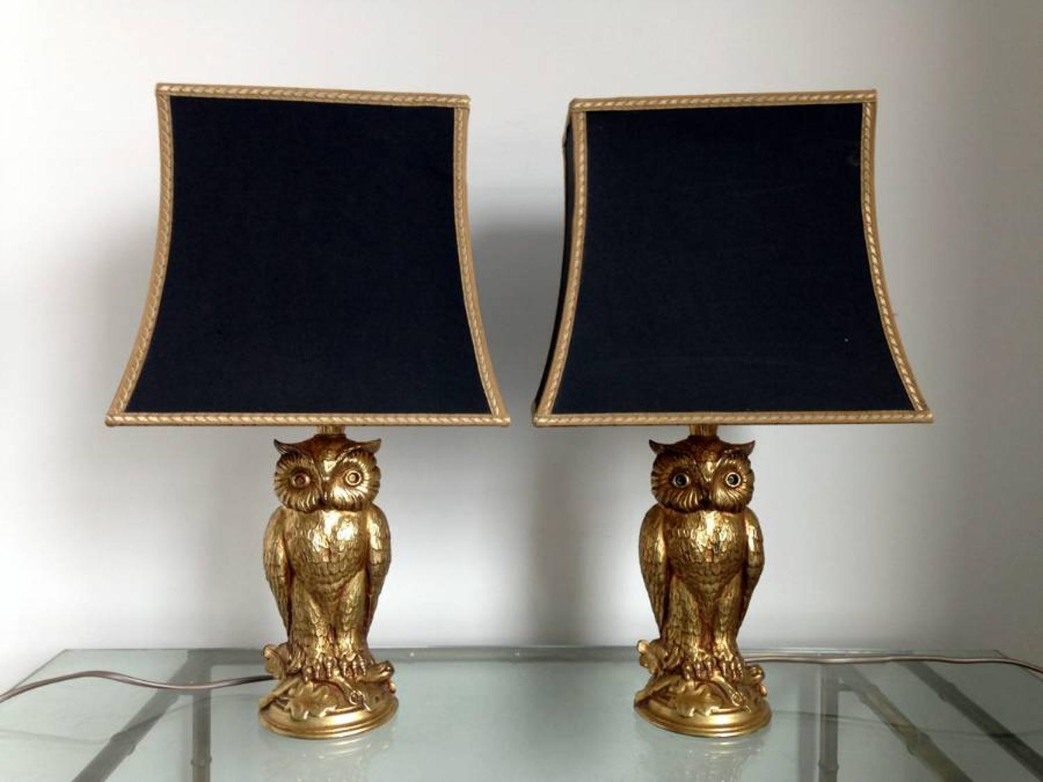 A pair of brass owl table lamps