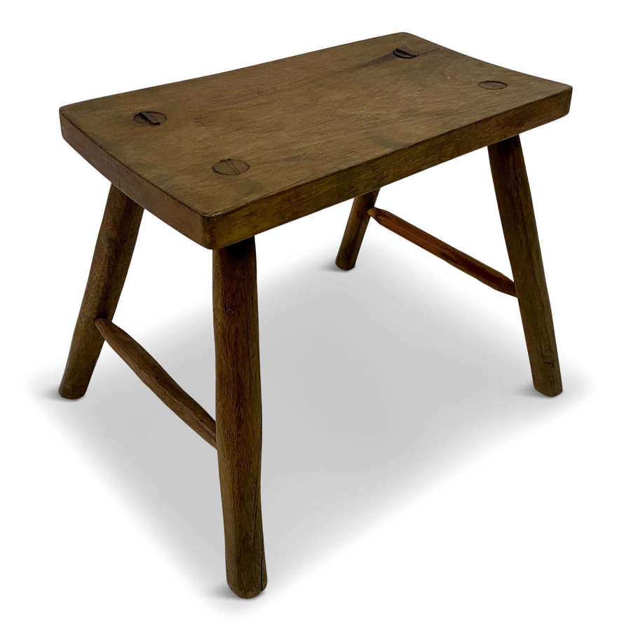 Vintage rustic milking stool side table